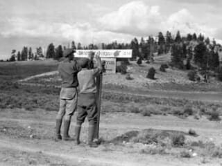Installing Direction Signs for Bryce 1920's